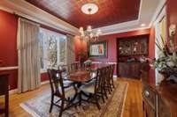 Beautiful Formal Dining Room With Trey Ceiling that has been hand painted. Pocket Door separate Dining Room from Kitchen,