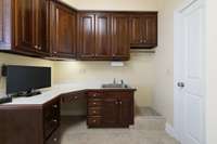 Desk & Storage Area in Laundry Room.