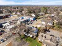 In the background of this photo there is located a lovely residential neighborhood of charming older homes.