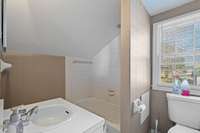 Upstairs bathroom in back unit B.
