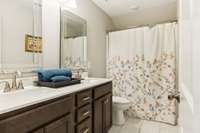 Full bath for bedrooms 3 & 4 with double vanity