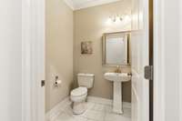 Convenient Half Bath on Main Level for Guests.