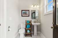 Pool Bath that can be easily accessed thought the door to the backyard.