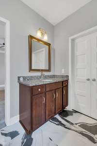 Separate vanities in Master Bathroom
