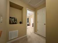 In this photo you see the storage closet across from the alcove also separating the bedrooms,