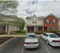 Plenty of parking spaces to accommodate this end unit townhome with covered front porch, enclosed patio with a storage room. 2 ensuite bedrooms UP with ½ bath down...extra large kitchen and living room. Utility room downstairs as well.