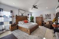 Huge primary bedroom with recessed lighting!