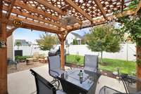 Large patio with pergola is great for entertaining!