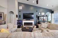 Electric fireplace with tile surround and surround sound speakers!