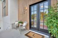 Framed by intentional lines and curated finishes, the front porch is both inviting and grounded in great design.