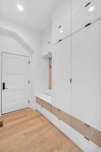 Outfitted by California Closets, the drop zone offers streamlined storage and intentional design that keeps the chaos out and the style intact.