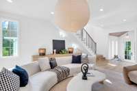 Minimalist banister add architectural interest while keeping the space feeling open and connected.