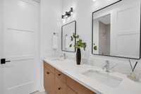 A thoughtfully designed Jack and Jill bathroom connects to the 3rd and 4th bedroom—perfect for siblings or guests.
