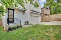 Tucked behind the garage, this additional green space offers privacy and versatility—paired with a separate entrance to the bonus suite, ideal for guests, work-from-home, or STR potential.
