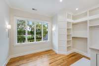 The Owner Suite closet is full of light and features custom drawers and luggage packing stations.