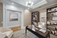 Upper level gathering room or library that opens to the center hall and guest suites. Opens to the 10' Wide Center Hall and features a luxe custom grasscloth wall covering.