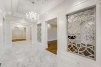 Exceptional open molding design panels creates and open feel to the living room and dining room.