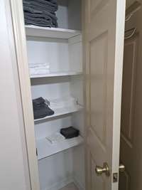 Linen closet 3rd bath - no shortage of closets or storage in this home!