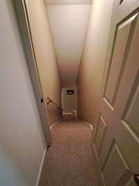 Upstairs landing down to main level.