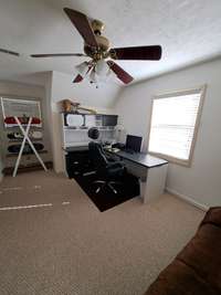 4th bedroom currently used as an office with futon for guests.