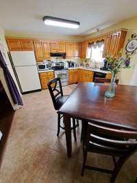 View from walk-in pantry - 8x4 shelving & storage galore off kitchen area.
