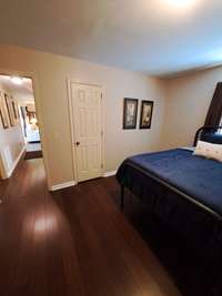Second bedroom downstairs with nice size closet. Would also make a great office!