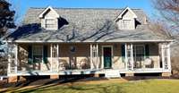 Welcome to 809 Hillside Dr, Springfield, TN 37172! Enjoy this front porch year round! Relaxing rockers & comfy chairs make secrets shared unforgettable memories!