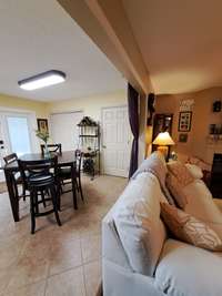 Another view of open floor plan and Great room/dining area. All can join in the fun in this open floor plan!