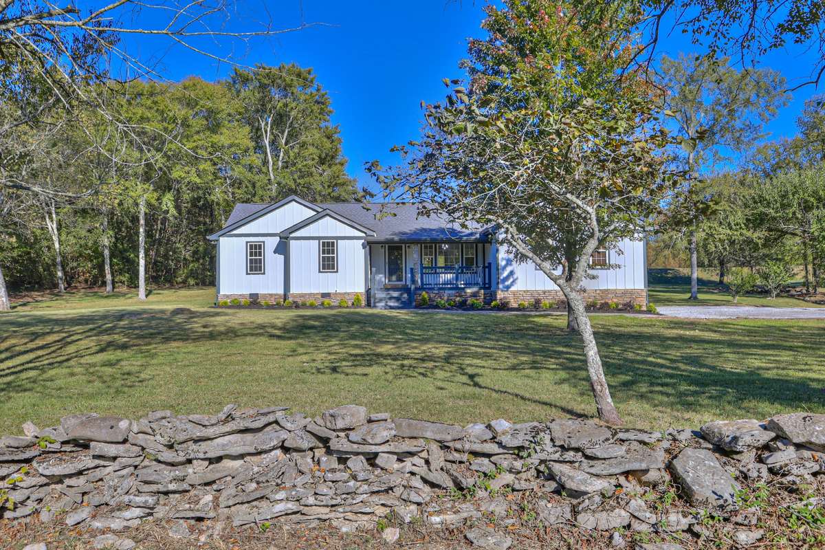 Rock wall gives this house plenty of character.