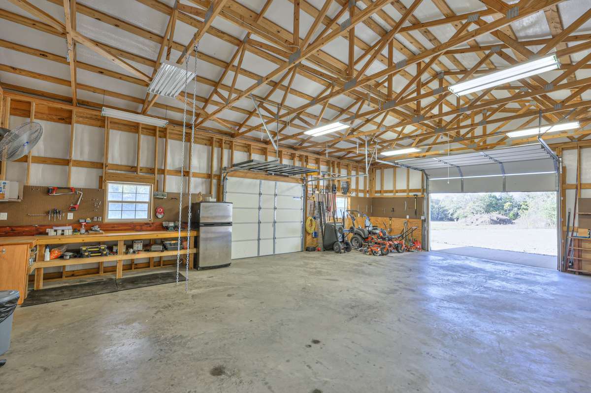 Plenty of workbench and storage in this heated/cooled 30'x40' metal barn