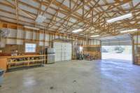 Plenty of workbench and storage in this heated/cooled 30'x40' metal barn