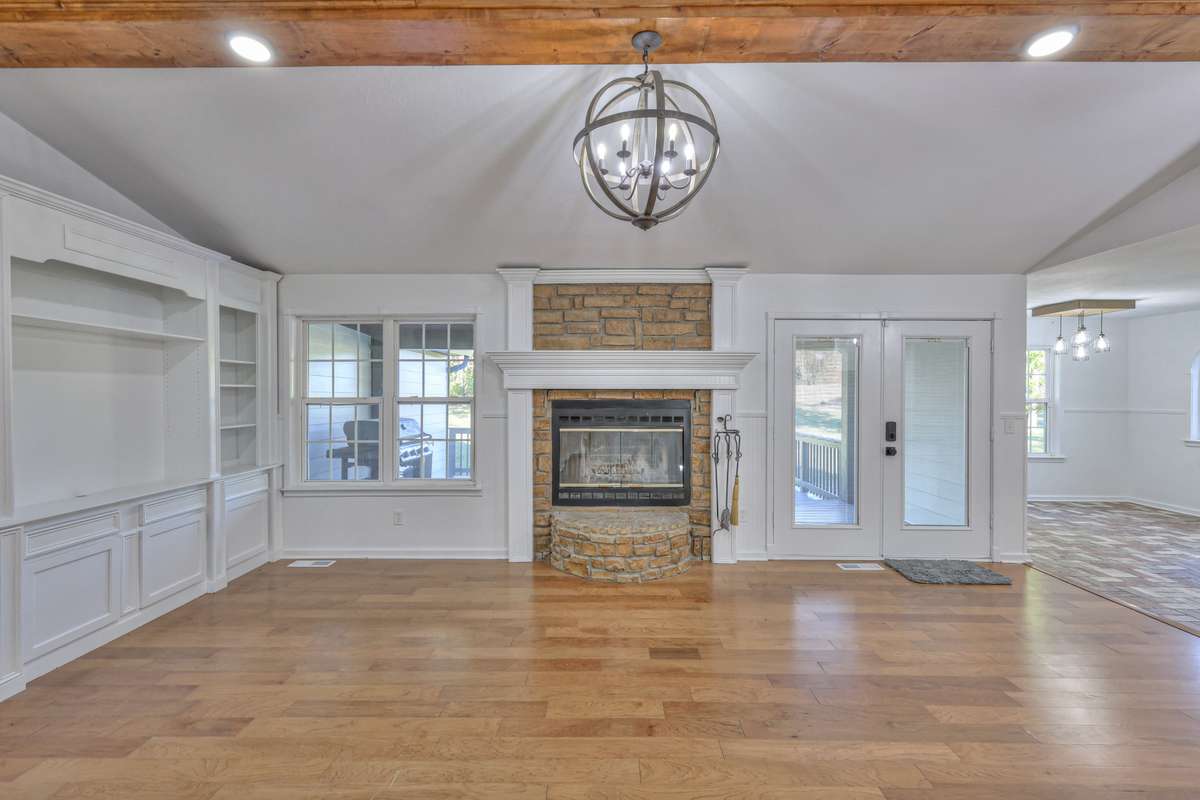 View as you come in the front door.  Real wood burning fireplace