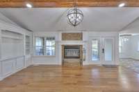View as you come in the front door.  Real wood burning fireplace