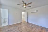 Office with separate HVAC split unit and private half bathroom