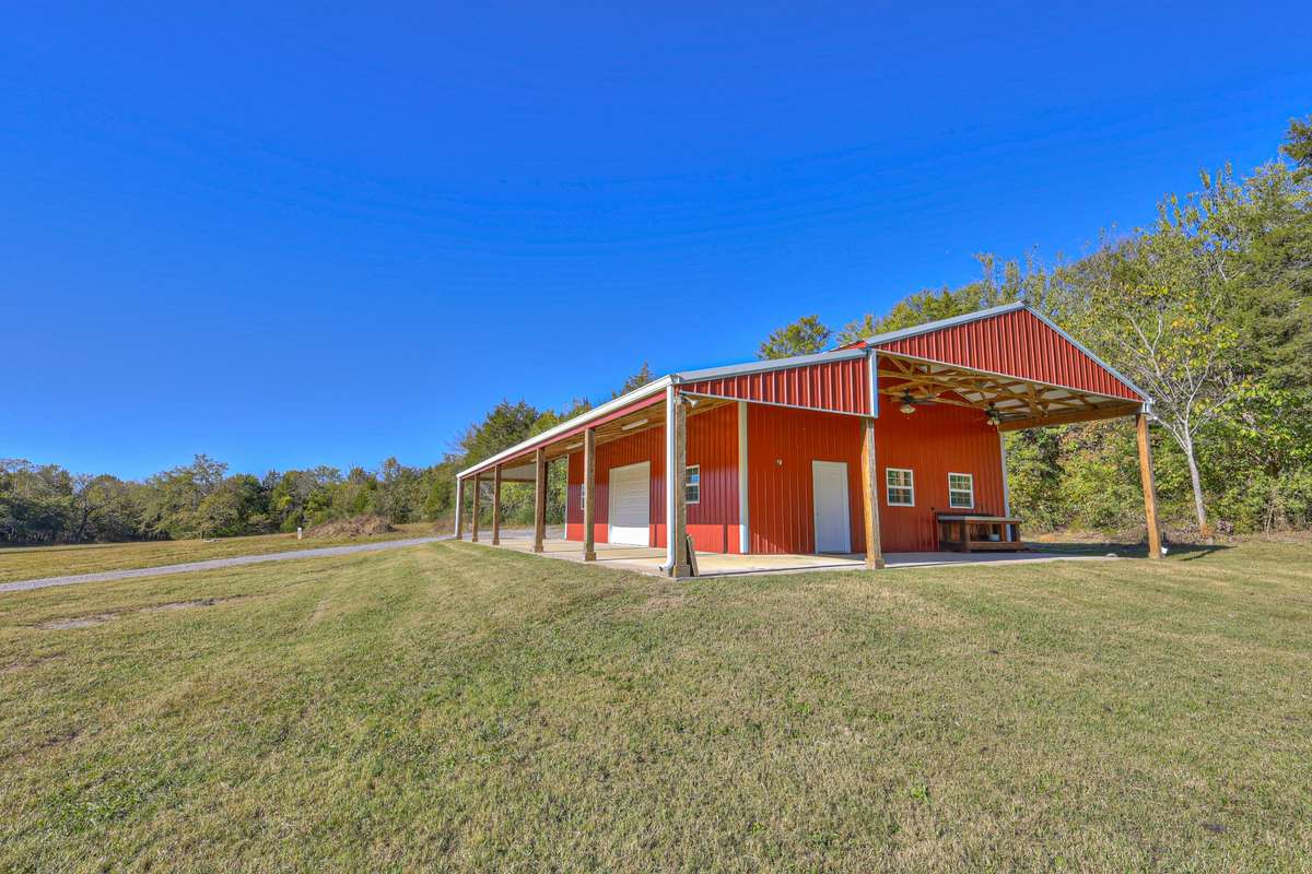 30'x40' heated/cooled metal barn with porches on 3 sides