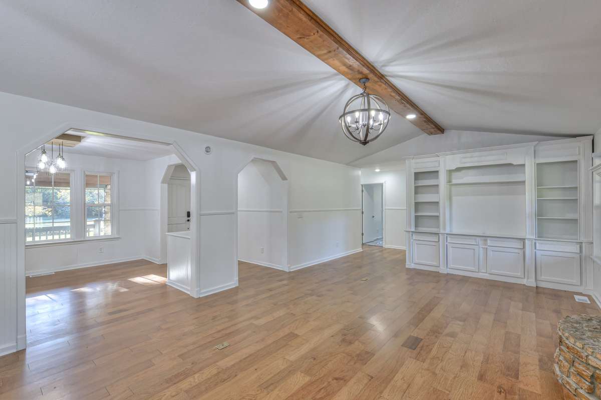 View of the family room and formal dining room from the kitchen