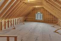 Fully Floored Attic w/ Plenty of Space for Future Additions