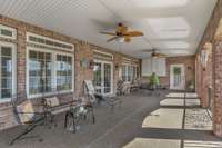 Main Level Covered Patio w/ Built In TV Cabinet