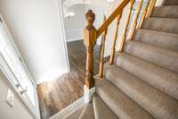 Newly pattern carpeted stairs and second floor.