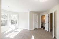 Primary bedroom with turret bay
