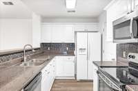 Beautifully designed kitchen area, combining style and functionality for the perfect culinary experience.