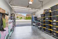 The unit includes a private garage accessible from the building's interior.