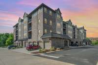 The community emphasizes security and convenience, featuring secure entry, elevator access, and a lock-and-leave lifestyle.