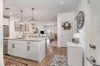 Featuring 42" cabinetry, a designer backsplash, granite countertops, and top-tier Whirlpool stainless steel appliances this kitchen is a chef's dream.