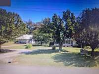Street view of both homes available . Sold Separately, Currently rented month to month. $900.00 month. Beautiful back yard with storage builds. Must have proof of funds for viewing request.Call Listing Broker  Sold AS IS -