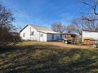 3742 Waynesboro Hwy, 3 bedroom 1 bath, new metal roof, beautiful area.  Large front and Back yard. Currently rented month to month $900.00 a month. Great investment opportunity Call Listed Broker. Ask For Financing Options through  Preferred Lender