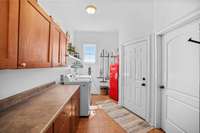Huge laundry room. Washer and dryer remain.