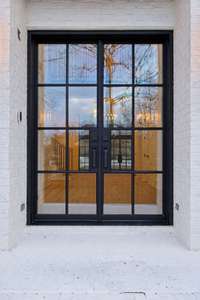 Beautiful new front doors from Iron Lion (all metal doors throughout are from Iron Lion).  All new PELLA Windows as well!
