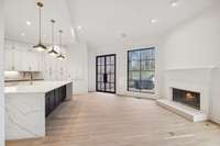 Gas fireplace in Keeping Room/Breakfast Area.  Waterfall Island is also set up for bar stools/casual dining.