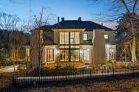 How gorgeous is this home from the backyard at dusk?